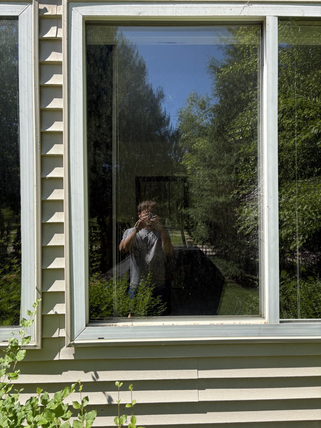 Same exterior window with crystal-clear glass after professional window washing